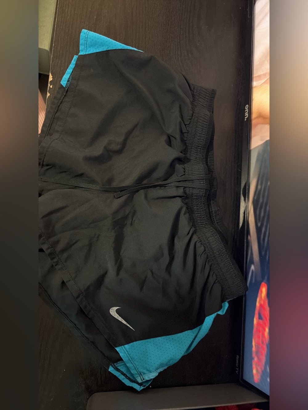 Nike Black Shorts with Teal Trim and Silver Swoosh